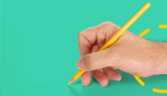 A hand holding a yellow pencil against a turquoise background.