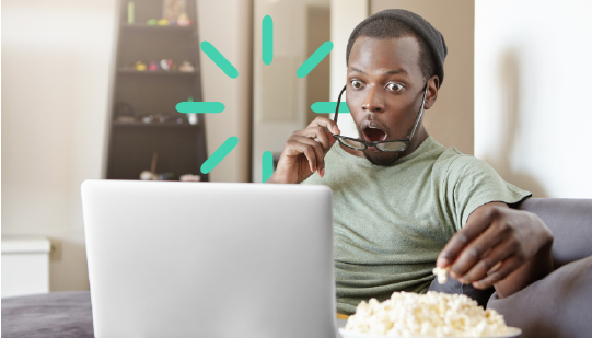 Viewer watching a series on his laptop - OTT Platforms