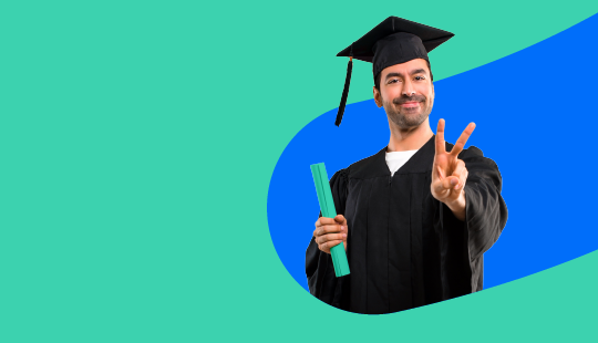 A person in a graduation cap and gown holds a rolled diploma in one hand and makes a peace sign with the other hand, standing against a teal and blue background.