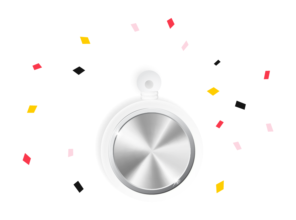 A sleek, round silver medal with a white edge is displayed with colorful confetti in the background.